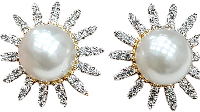 Surya pearl tops rising out of the Aumhika box